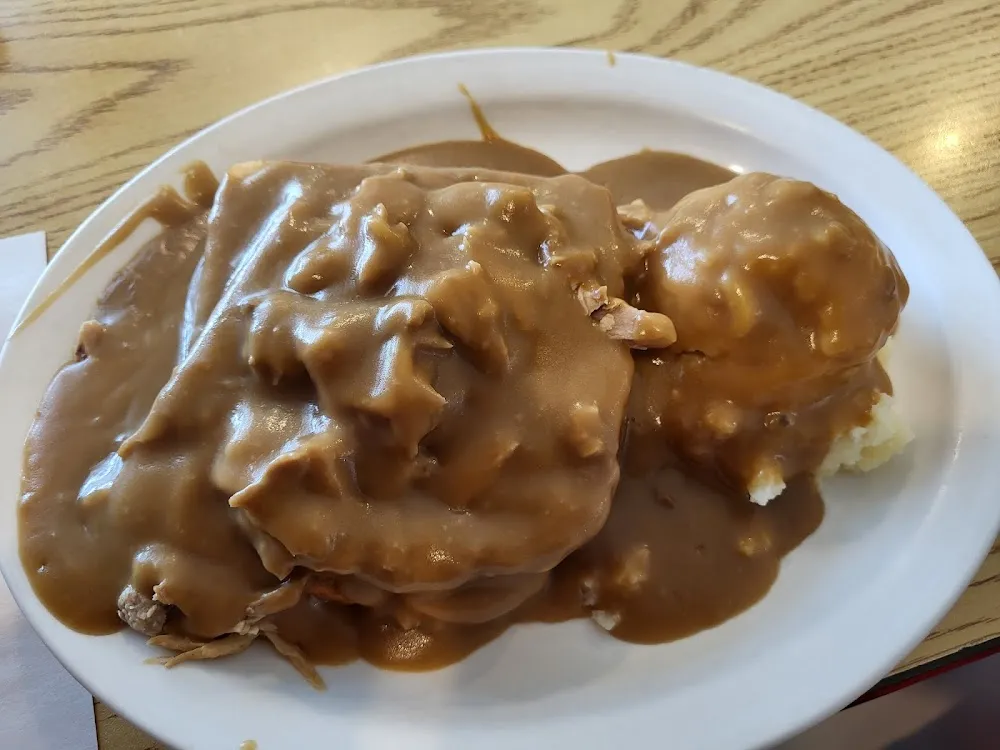 Roast Pork over Real Mashed Potatoes with Gravy